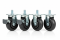 Knurr Heavy-Duty Caster Set 125mm 4-Pack — Studio shot showing two brake casters and two plain swivel casters with fork, wheel, and mounting bolt